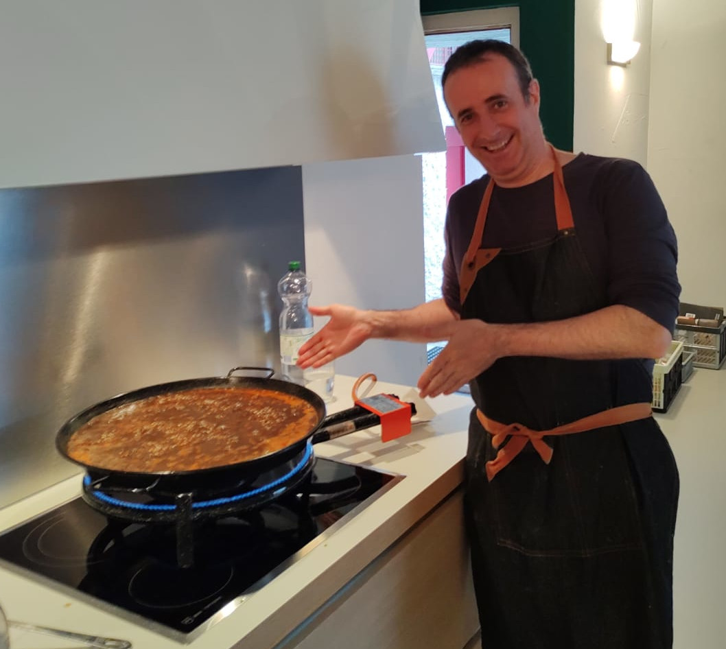 Gustavo preparing paella for the team after the SOLA